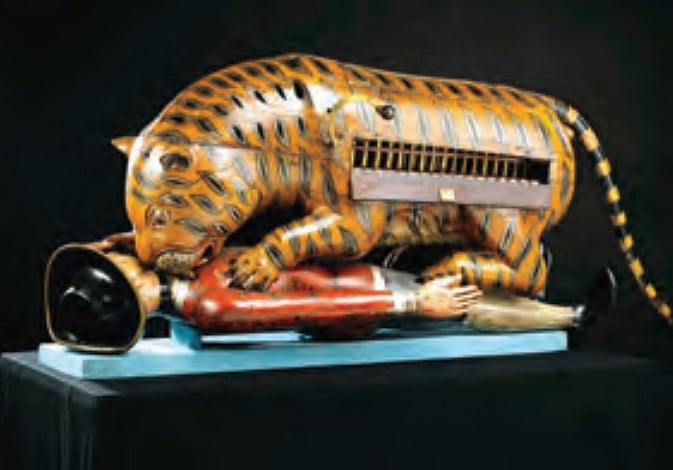 Tipu’s Tiger, a life-size wooden automaton made for Tipu Sultan
shows a tiger mauling a European man. The artefact was taken to
London by the British after the fall of Seringapatam in 1799.