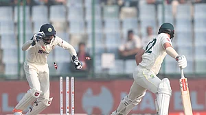 Australia's Travis Head is caught behind for 43 runs off R. Ashwin during the 2nd Test on Sunday at Ferozeshah Kotla stadium, Delhi