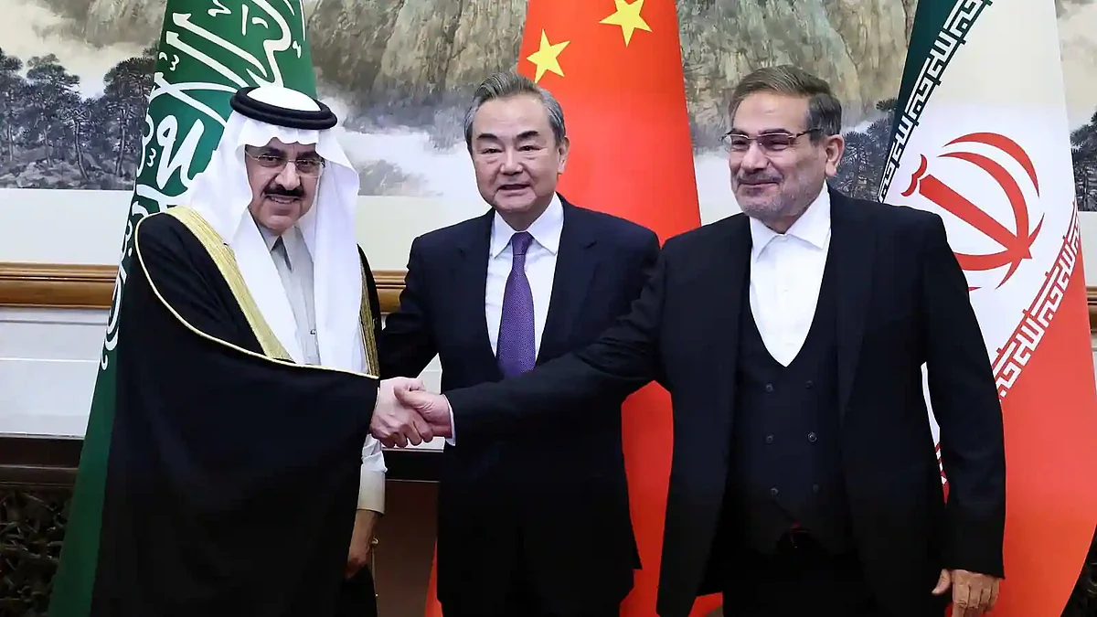 Videos on Iranian state media showed Ali Shamkhani (left), the secretary of Iran’s Supreme National Security Council, with Saudi national security adviser Musaad bin Mohammed al-Aiban (right) and Wang Yi, China's most senior diplomat.
