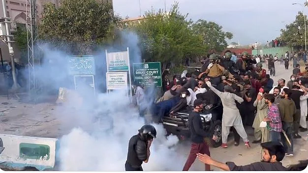 Former PM Imran Khan's supporters clash with police outside Islamabad court complex, 18 March