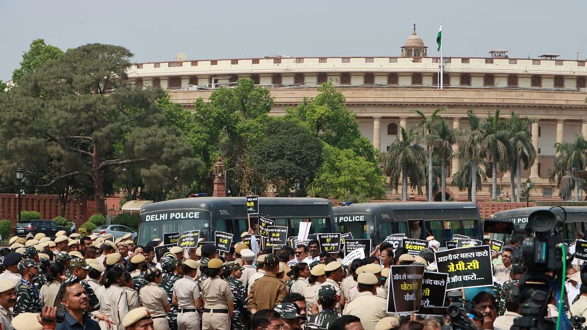 Opposition MPs protest outside Parliament House demanding a JPC probe into the Adani scam. 
Photo: Vipin