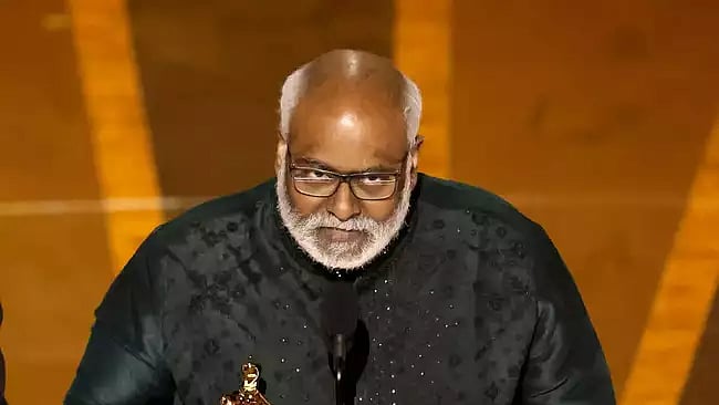 M. M. Keeravani accepts the Best Original Song award for 'Naatu Naatu' from 'RRR' onstage during the 95th Annual Academy Awards at the Dolby Theatre on March 12, 2023 in Hollywood, California. 