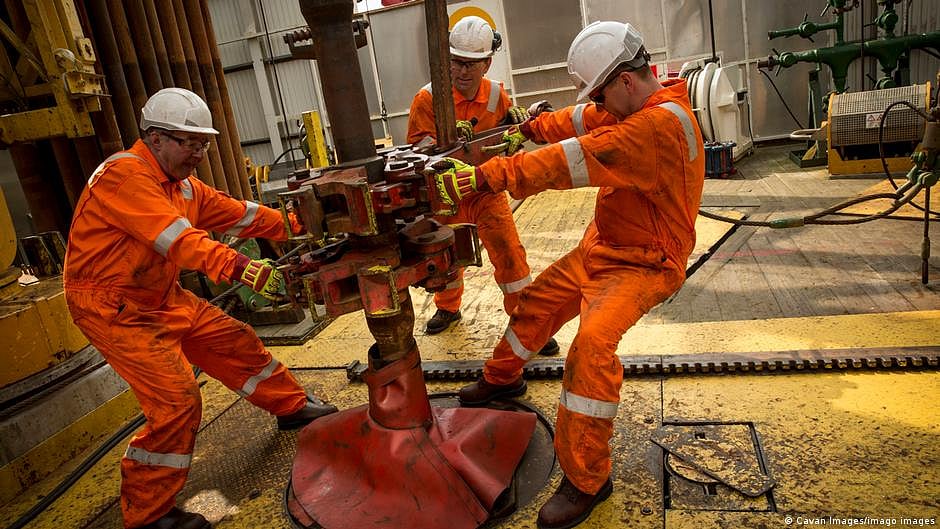 Oil price jumps amid production cuts