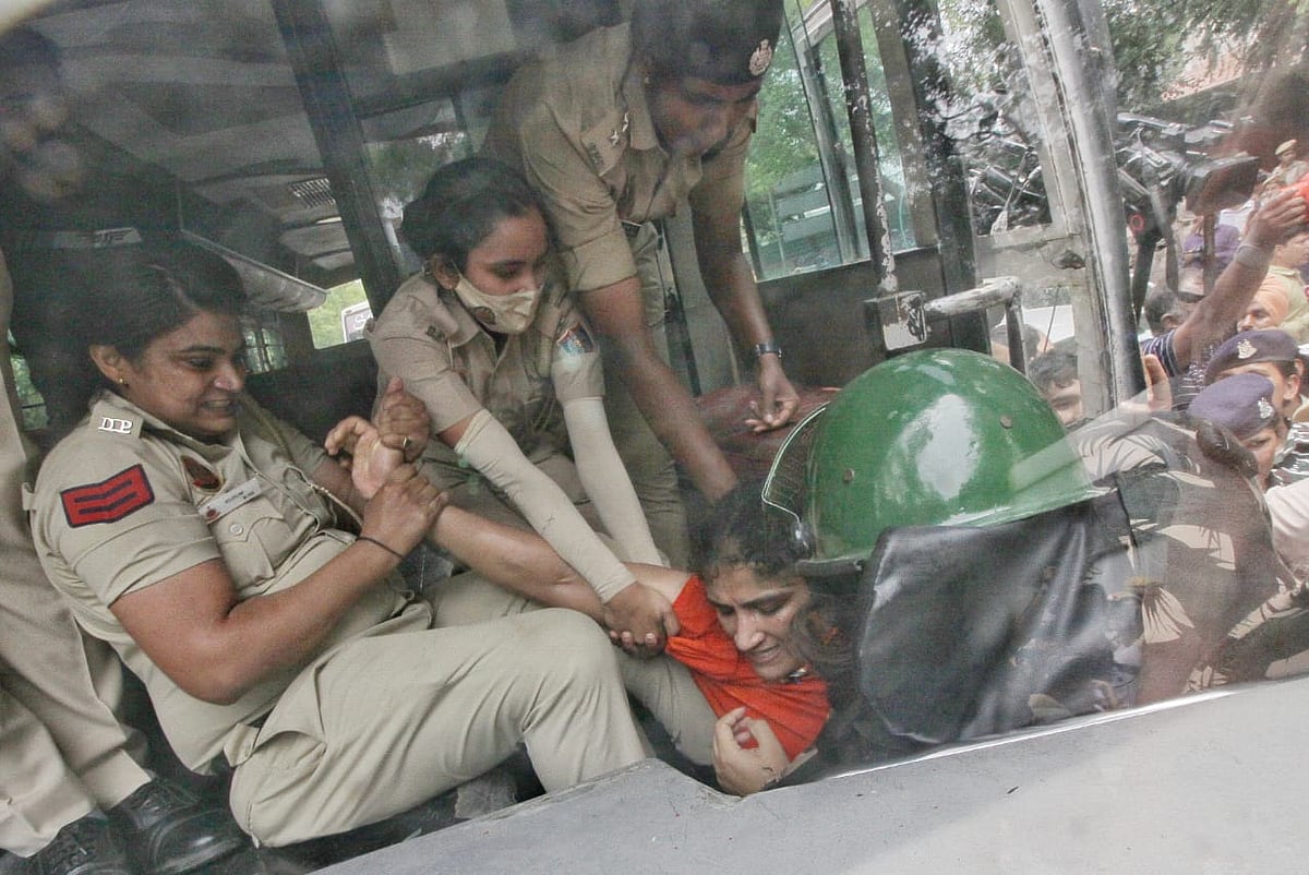 Vinesh Phogat is bundled into the police van. (Photo: Vipin)