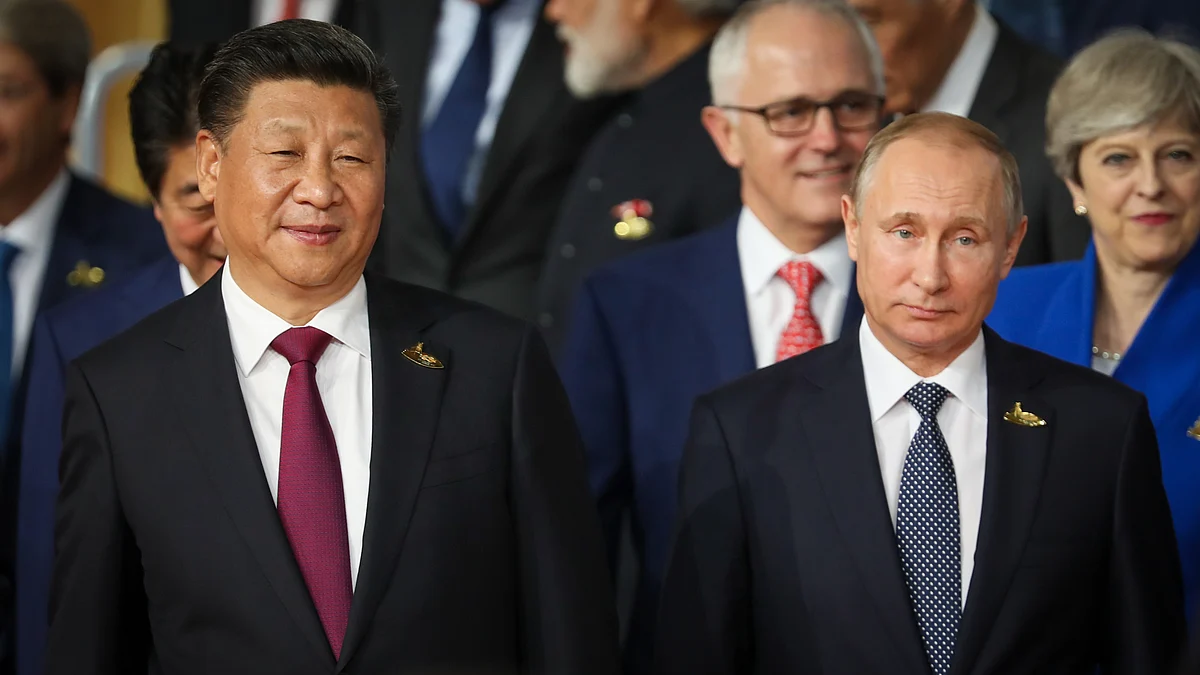 Chinese President Xi Jingping (left) with Russian President Vladimir Putin. (Photo: Matt Cardy/Getty Images)