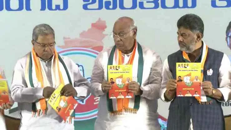 Mallikarjun Kharge, Siddaramaiah (left) and D K Shivakumar at the manifesto launch event (Photo: Screengrab/Youtube@INCIndia)