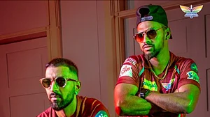 Krunal Pandya (left); Nicholas Pooran (right) of LSG in Mohun Bagan colours (Photo Courtesy: LSG/Twitter)