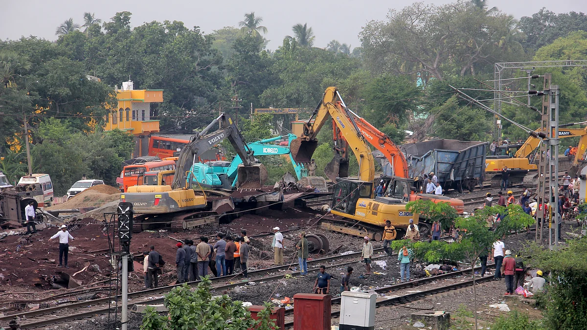 Railway and NDRF workers at the Coromandel Express train accident site engaged in restoration at the Bahanaga station of the Balasore district in Odisha's capital city Bhubaneswar. (photo: Getty Images)