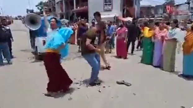 People in Imphal smash their radio sets to stress their boycott of PM Modi's 'Mann Ki Baat' radio broadcast on Sunday, 18 June