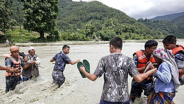 A river in spate in Nepal (Photo courtesy: @MobilePunch/ Twitter