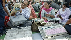 Officials examine EVMs before polling for the municipal election in UP’s Ghaziabad, May 2023 (Photo: Getty)