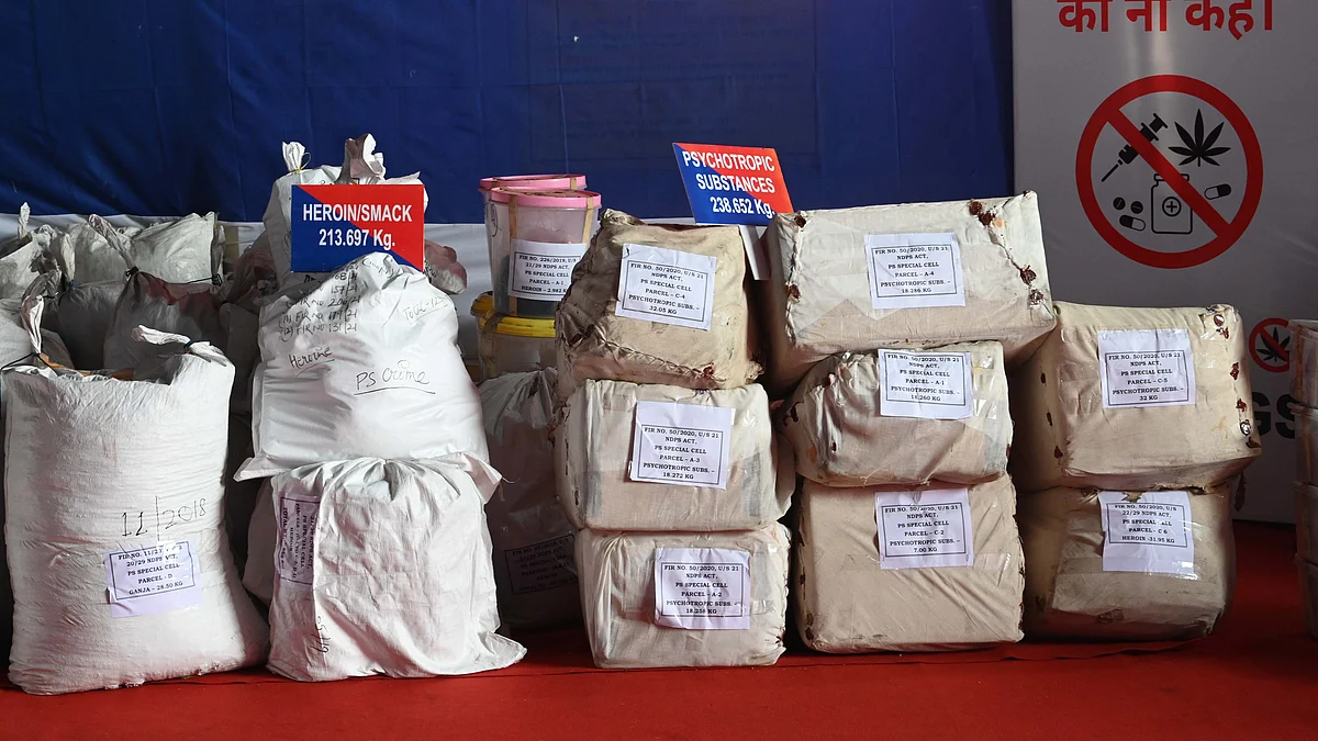 Bundles of drugs were arranged prior to destroying them at an incinerator by Delhi Police under the Centre's 'Nasha Mukt Bharat Abhiyan', at Amritapuri, Nilothi Village, on December 21, 2022. (photo: Getty Images)