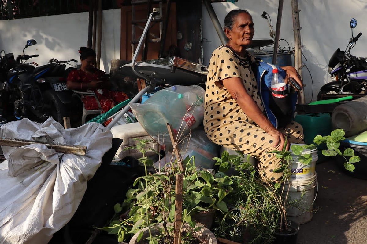 Without a roof over her head, she awaits (Photo Courtesy: AICCTU)