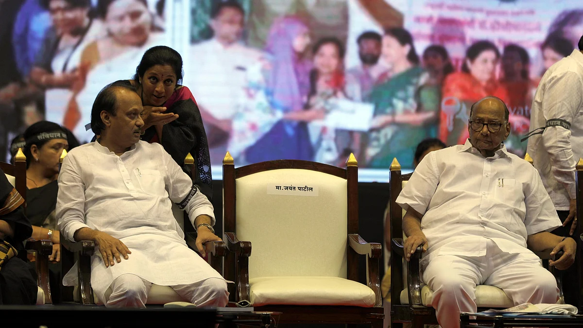 (L-R) Ajit Pawar, Supriya Sule and Sharad Pawar at a party event in Pune, October 2018 (photo: Getty Images)