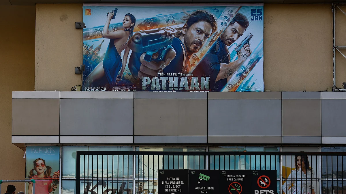 Poster Of Shahrukh Khan's movie Pathaan is installed outside a cinema (Photo: Getty Images)