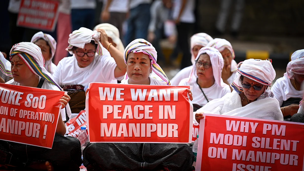 Women from Manipur raise slogans during a protest over the ongoing violence in the state, at Jantar Mantar (Photo: Getty Images )