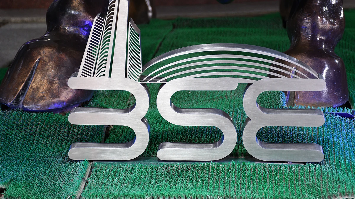 Bombay Stock Exchange (BSE) emblem is seen at the entrance of the building in Mumbai.
(Photo: Getty Images)