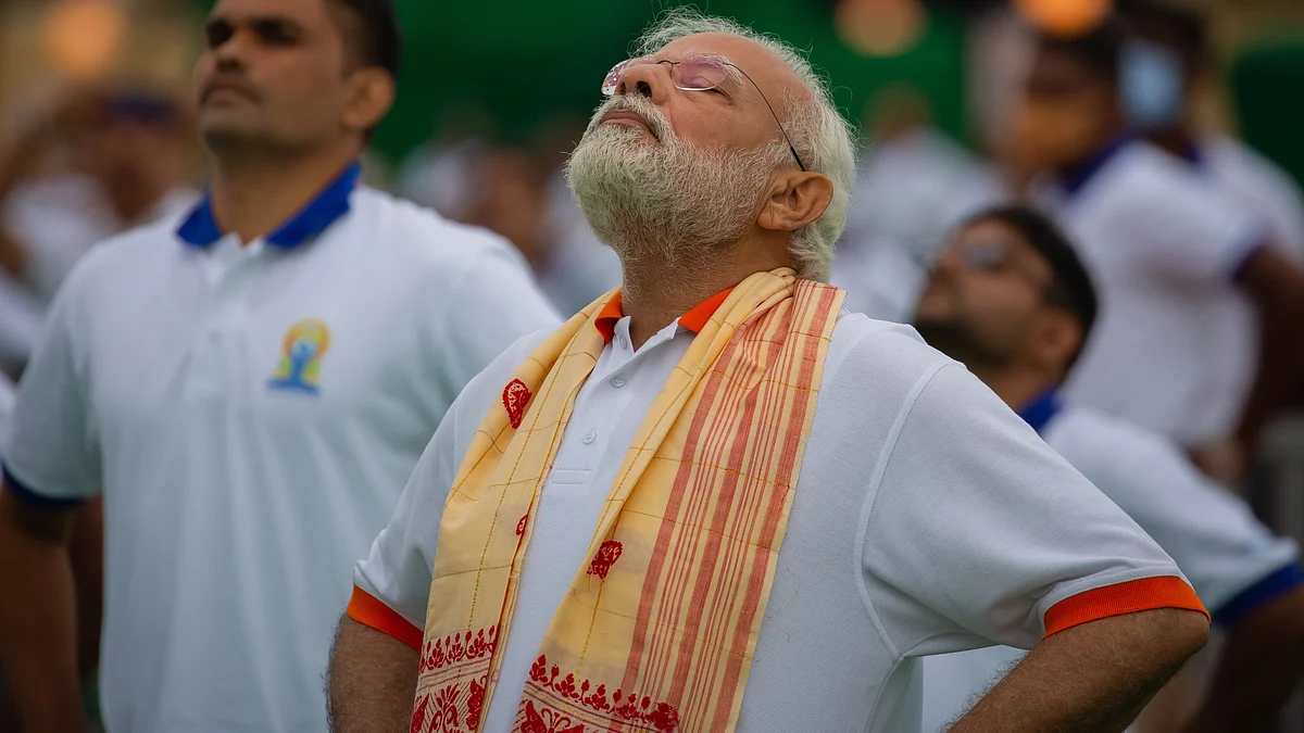 Indian prime minister Narendra Modi performs yoga in front of the Mysore Palace during the International Day of Yoga celebrations on 21 June 2022 (photo by Abhishek Chinnappa/Getty Images)