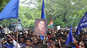 Bhim army supporters with B.R. Ambedkar's photo frame (Photo: Vipin/National Herald)