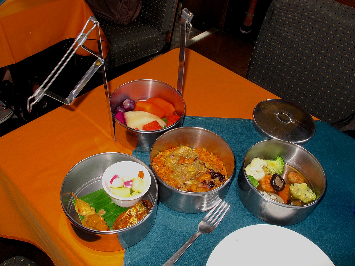 Lunch packed in an old-fashioned tiffin box (photo by David Sutton/South China Morning Post via Getty Images)