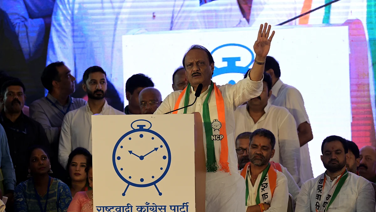 Maharashtra's deputy CM Ajit Pawar along with his faction Nationalist Congress Party (NCP) supporters MLAs during the meeting in Mumbai on July 5. (photo: Getty Images)