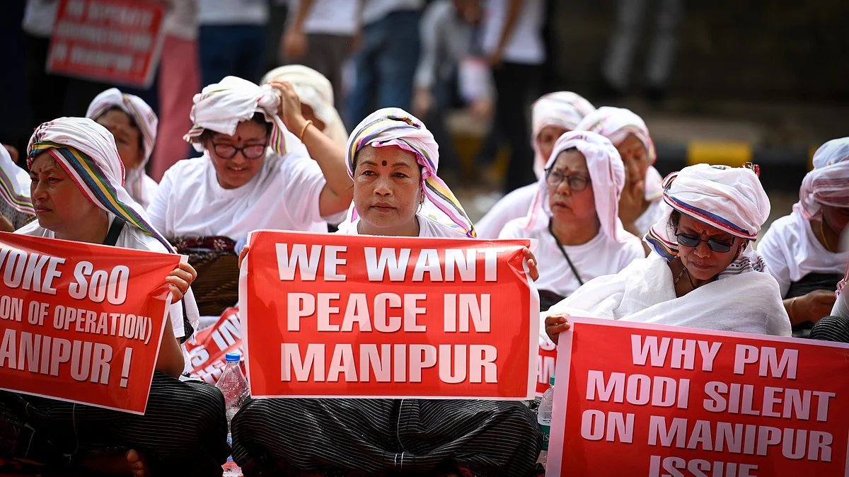 Women from Manipur raise slogans during a protest over the ongoing violence in the state, at Jantar Mantar (Photo: Getty Images )