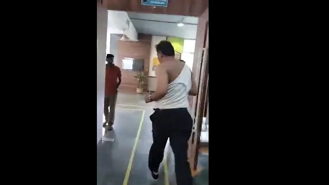 Screengrab from the viral video shows the principal running from a mob (Photo: Twitter/ @HindutvaWatchIn)