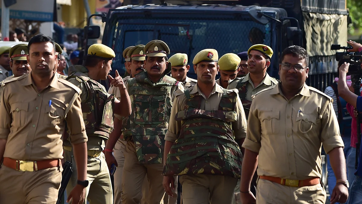 Atiq Ahmad (In Prison van )  is taken to prison by police after being convicted in session court , for Umesh Pal Kidnapping case , in Allahabad on March 28, 2023. (Photo by Ritesh Shukla ) (Photo by Ritesh Shukla/NurPhoto via Getty Images)