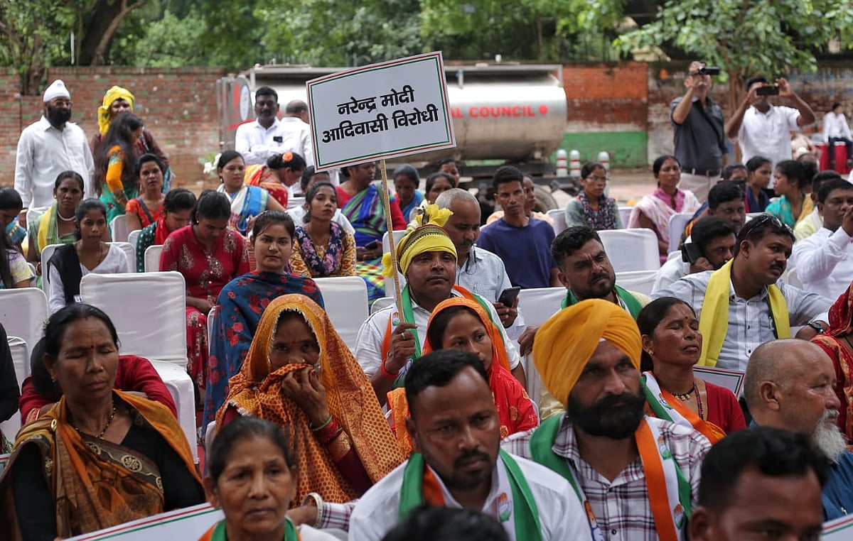 "Narendra Modi Adivasi virodhi," says a placard (Photo: Vipin/National Herald)