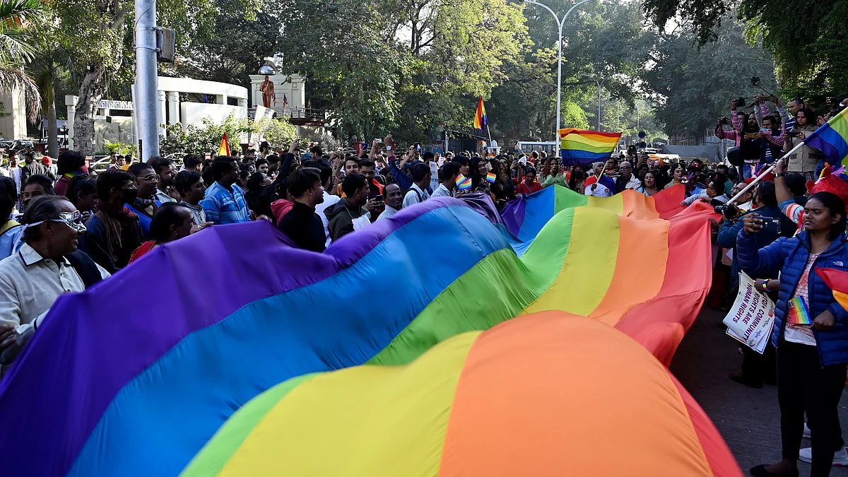 People seen holding a huge LGBT flag during the LGBTQI+ Pride Parade  (Photo: Getty Images)