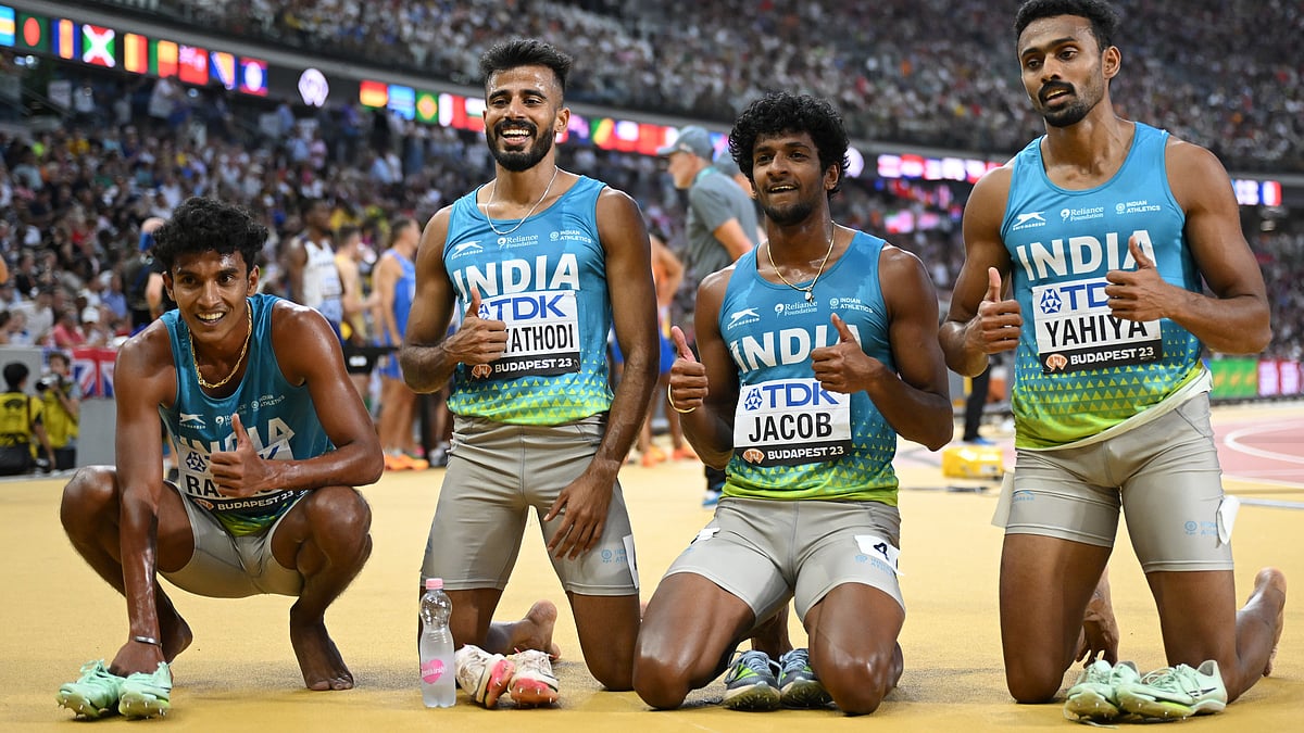 Rajesh Ramesh, Muhammed Ajmal Variyathodi, Amoj Jacob, and Muhammed Anas Yahiya of  Team India  pose for a photo after the Men's 4x400m Relay Heats (Photo by Shaun Botterill/Getty Images)