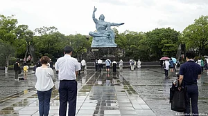Japan scales back Nagasaki memorial amid storm