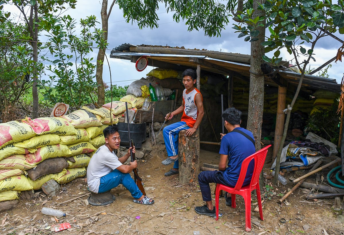 Armed volunteers from the Hmar tribe during a frontline operation at Kangvai checkpoint in Churachandpur district, in Manipur (photo by Biplov Bhuyan/SOPA Images/LightRocket via Getty Images)