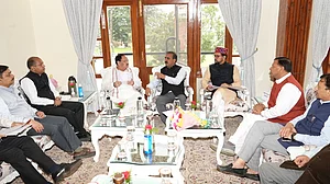 Chief Minister Sukhvinder Singh with BJP chief J.P. Nadda and Union minister Anurag Thakur at a meeting in Shimla