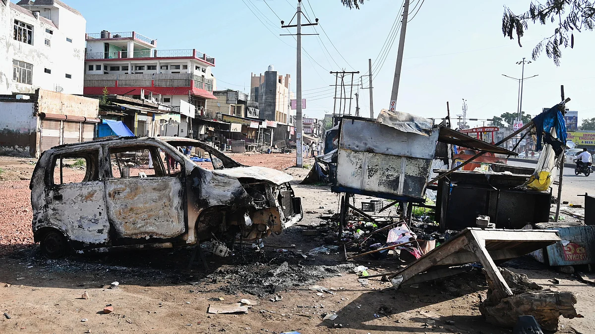 Damaged vehicles following the violent communal clashes at Ambedkar Chowk in Sohna, Nuh district, Haryana on Monday, August 1. (photo: Getty Images)