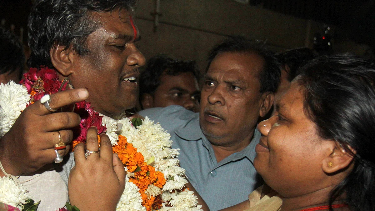 MP Faggan Singh Kulaste was garlanded on his release from Tihar jail on bail in 2011. His reception by Mandla's tribes at the 2023 Madhya Pradesh state elections may not be as pleasant (photo: Sonu Mehta/Hindustan Times via Getty Images)