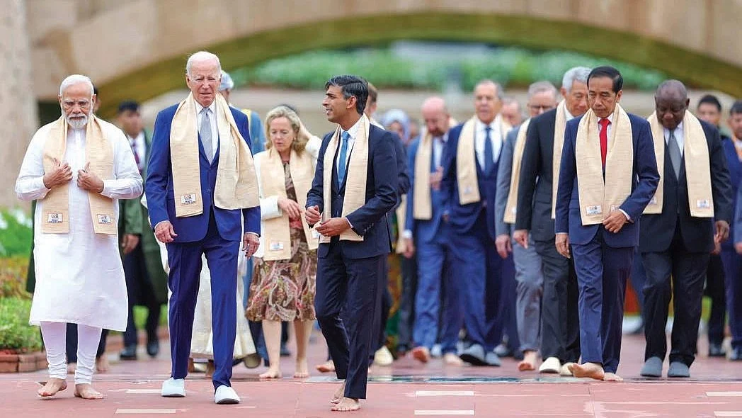G20 leaders arrive at Raj Ghat to pay homage to Mahatma Gandhi on the concluding day of the summit in New Delhi.