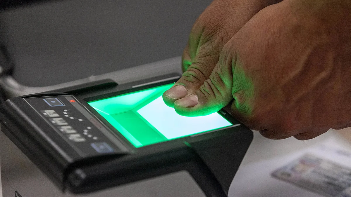 Representative image of a biometric scanner reading a thumb print (photo: Stephen Zenner/SOPA Images/LightRocket via Getty Images)