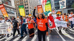 Climate change: Thousands march in NYC ahead of UN summit