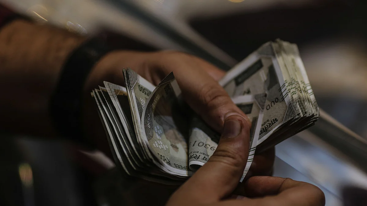 Indian Rupee hits record low Amidst surging global oil prices (Photo: Dhiraj Singh/Bloomberg via Getty Images)