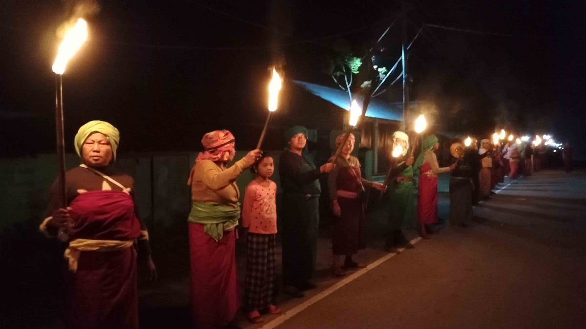 Women form human chain protest demanding peace in Manipur state on 17 June, 2023. (Photo by Anuwar Hazarika/NurPhoto via Getty Images)