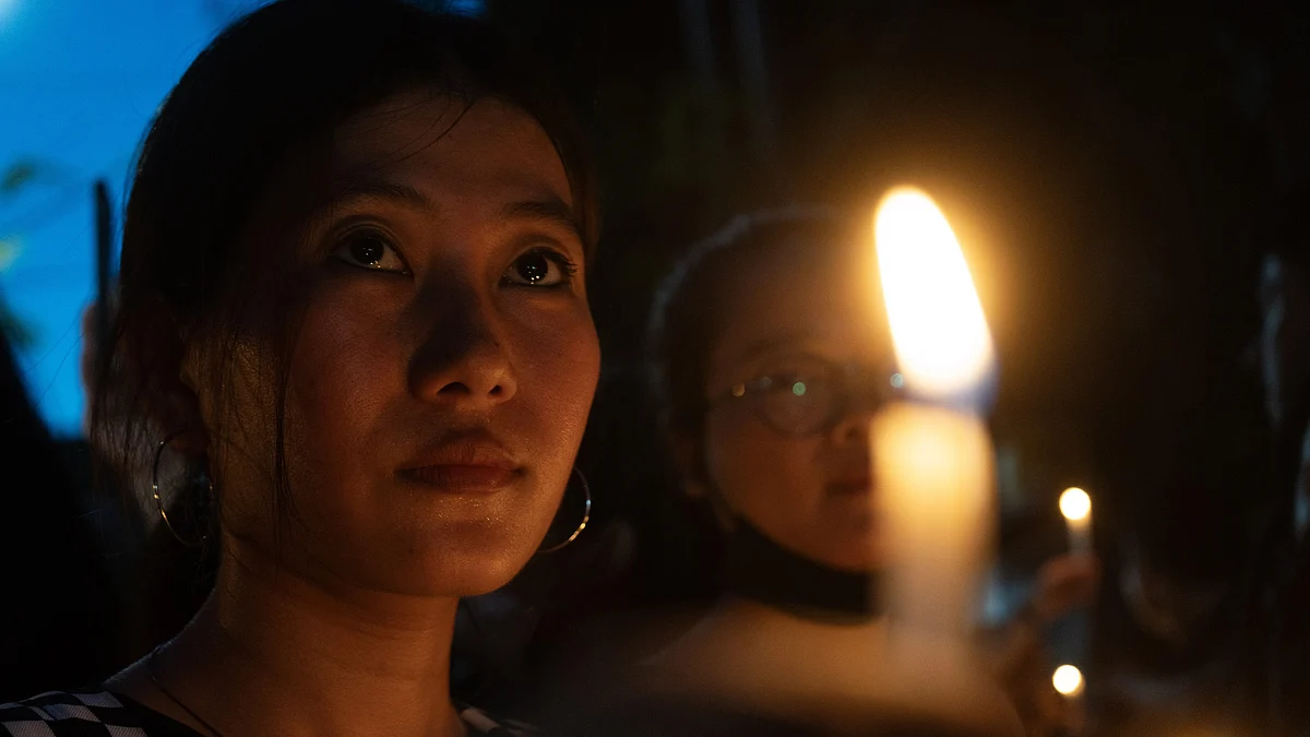 Demonstrators in Guwahati during a candlelight protest over the alleged sexual assault of two Kuki women during the ongoing  communal violence in Manipur (photo: David Talukdar/NurPhoto via Getty Images)