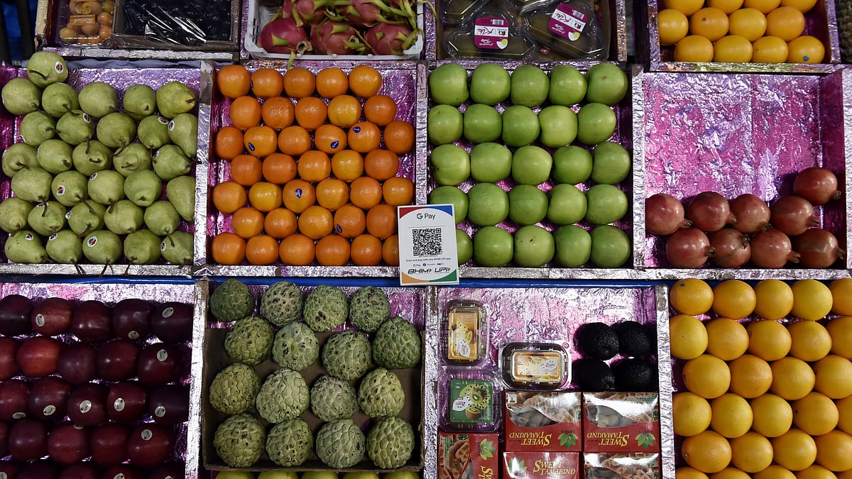 UPI (Universal Payments Interface) code is seen in a fruit shop in Mumbai (Photo: Getty Images)