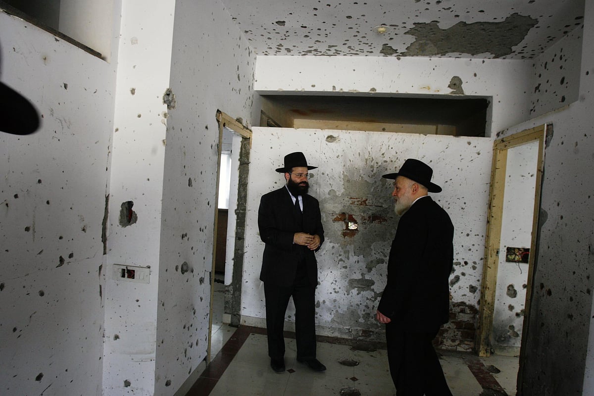 Rabbi Avraham Berkowitz inside the bullet-scarred Chabad House in Mumbai in 2009 (photo: Getty Images)