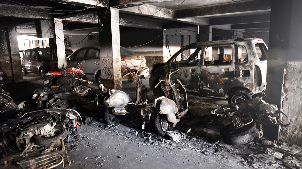 A fire ignited at 3 a.m. in Jay Bhavani Building's 2,000 sq ft parking lot on MG Road spread to cars, bikes, and upper floors. (Representative image) (photo: Vipin Kumar/Hindustan Times via Getty Images)