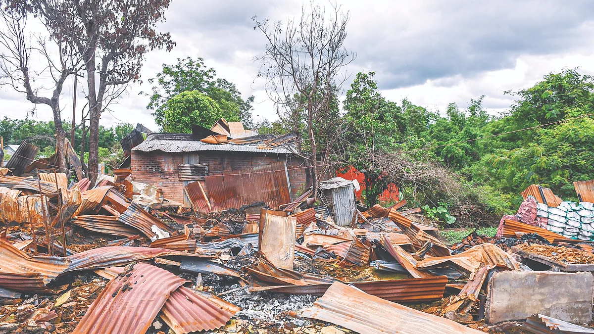 The remains of burnt houses in Torbung village, about 10 km from Churachandpur in Manipur. (Photo: Getty Images)