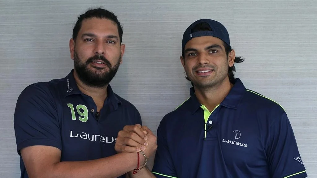 Neeraj Chopra (right) strikes a pose with former India cricketer Yuvraj Singh, a fellow Laureus ambassador (photo: Laureus)