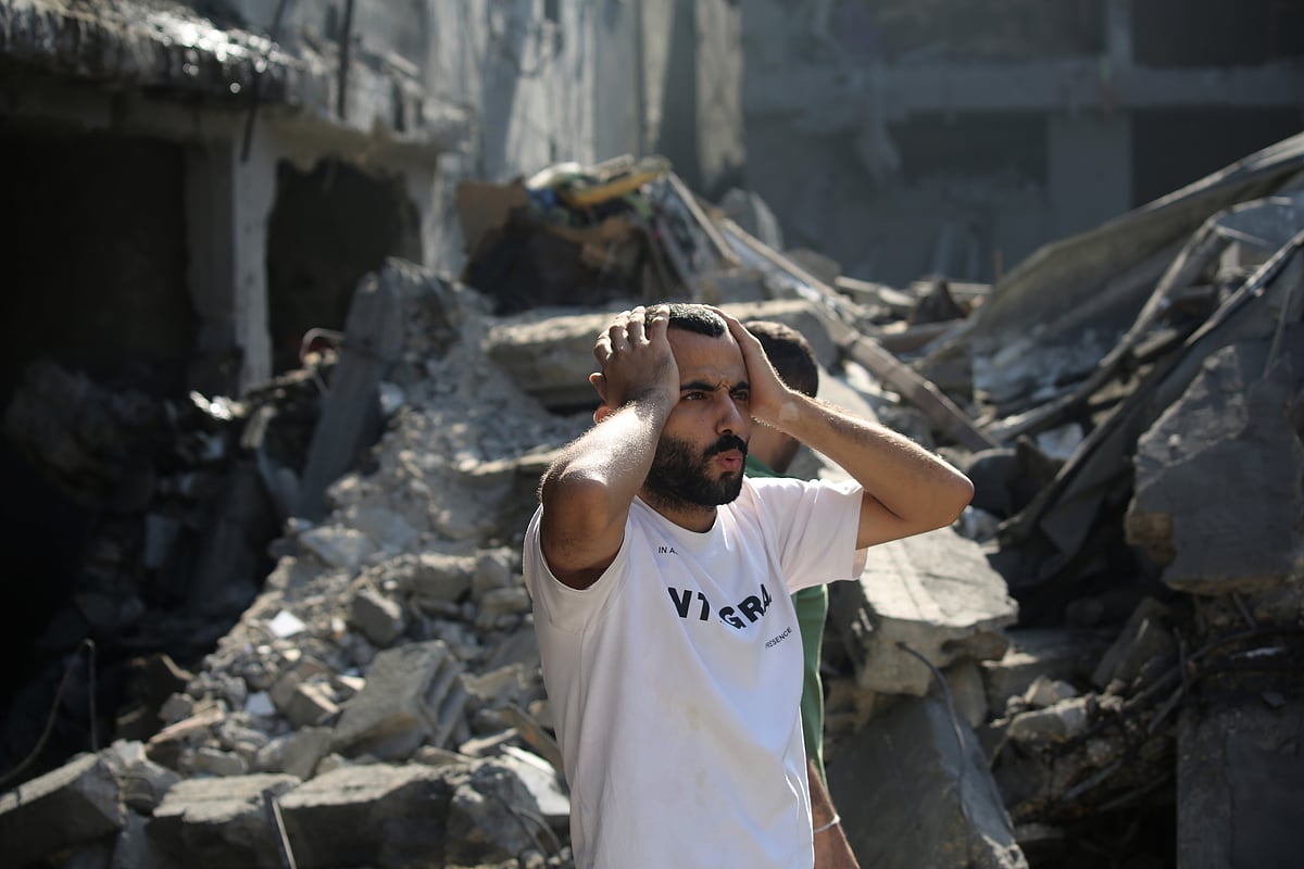 Palestinian citizens inspect damage to their homes caused by Israeli airstrikes (Photo Getty Images)