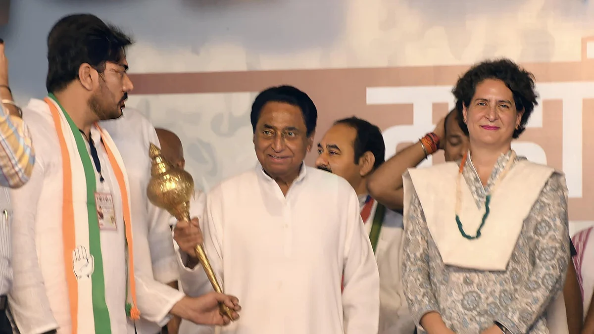Senior Congress leader Kamal Nath (centre) holds a mace, flanked by Vikram Mastal (left)—who stoof against former BJP CM Shivraj Singh Chouhan in the Madhya Pradesh Assembly election 2023—and Priyanka Gandhi (photo: Vikram Sharma/Facebook)