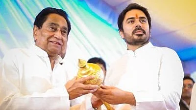 Former Madhya Pradesh CM Kamal Nath (left) and Congress candidate for MP, Vikram Mastal (Photo: IANS)